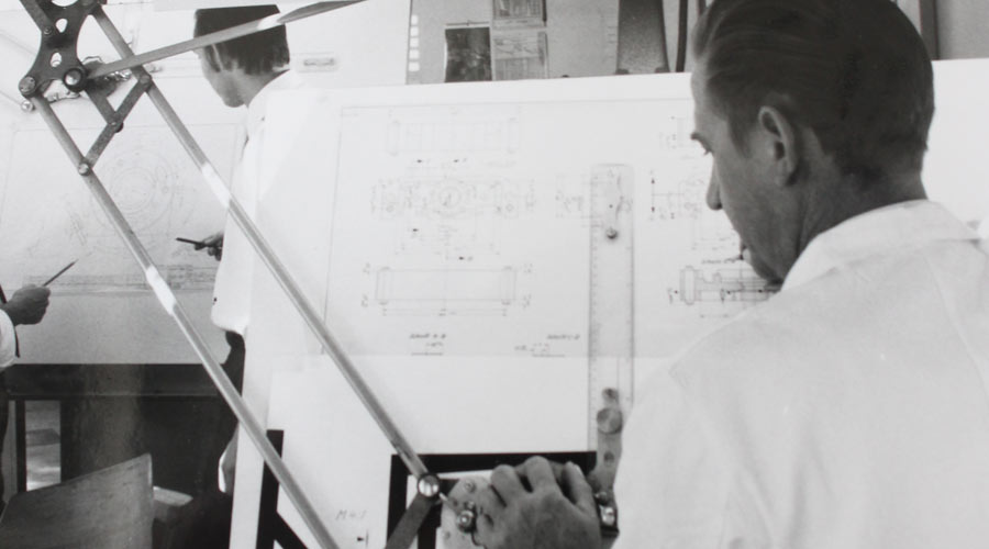 Conscientious planning and design at the supplier of sensor technology EBE Elektro-Bau-Elemente GmbH.The picture shows the work of the designers at drawing boards in the earlier decades of the company history